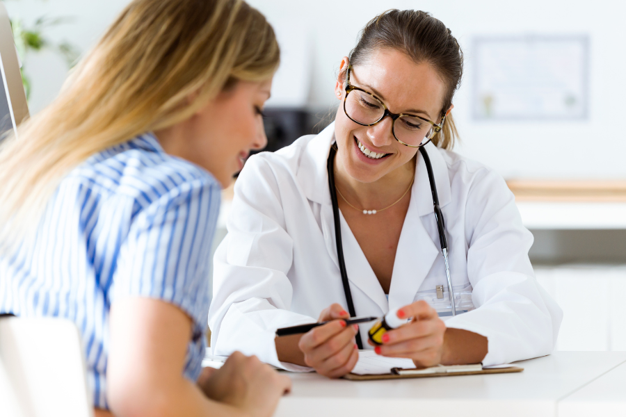 Doctor discussing care with a patient in a positive setting